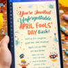 Editable April Fools invitation displayed on tablet with vibrant festive background